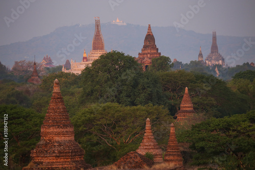 Sunrise over the valley with the ancient pagodas in Bagan