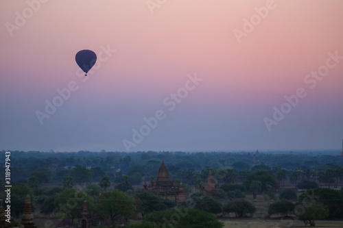 Balloons flying over the ancient pagodas in Bagan
