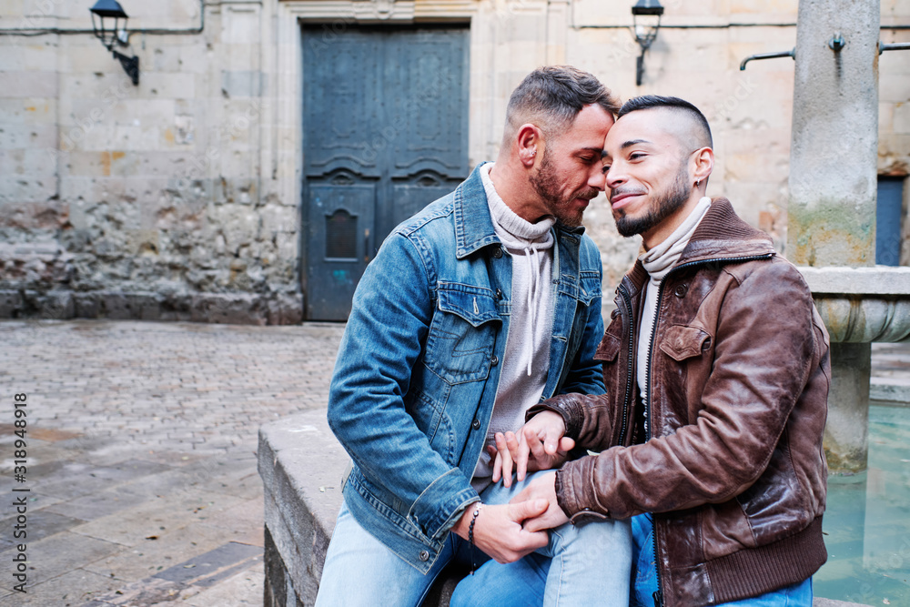 gay couple kissing at Barcelona - gay concept