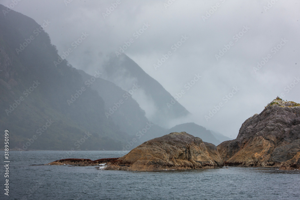 Doubtfull Sound. Fjordland New Zealand. South Island. Cloudy. Fog.