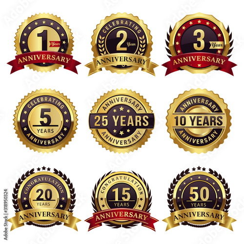 set of anniversary gold badges and labels