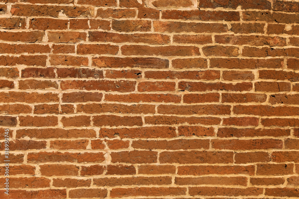 Obraz premium The texture of a brick wall of a thousand years old on an ancient pagoda in Burma