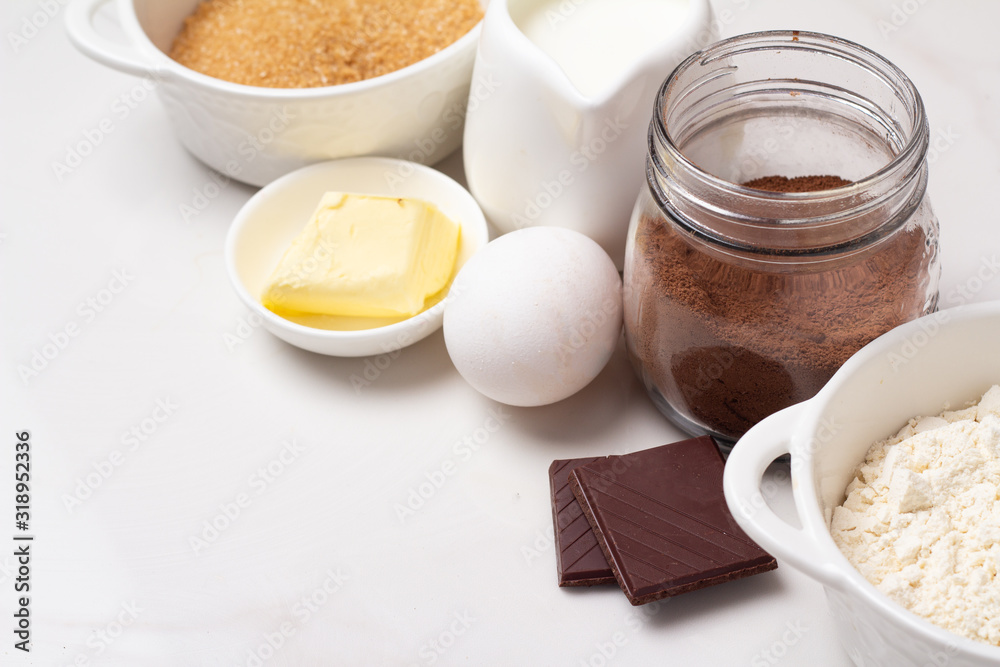dessert baking ingredients: flour, cocoa, butter, milk dessert baking ingredients: flour, cocoa, butter, milk