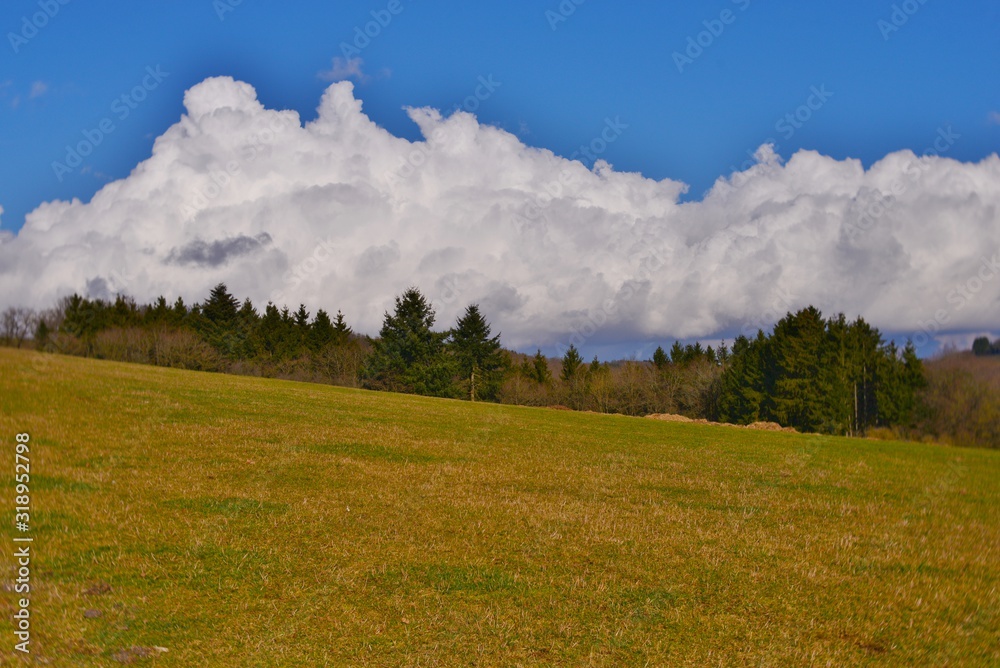 Obraz premium landscape with hills and clouds