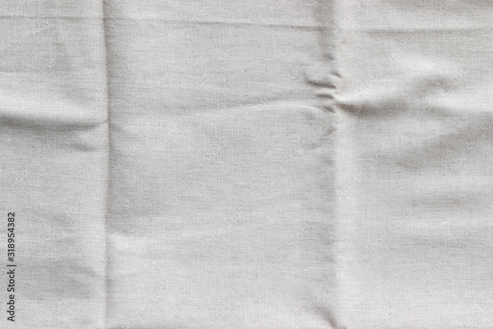 Soft light gray natural linen texture. Crumpled fabric background Soft light gray natural linen texture. Crumpled fabric background
