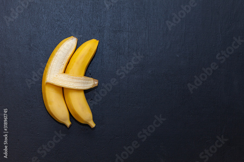 Two bananas on a chalkboard. One banana hugging the other. The text in chalk 