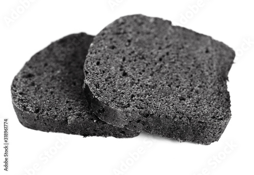 Black bread. Bakery products. Dough. Black flour. Loaf of bread. © Sagittarius_13