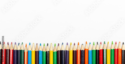 Colorful background from pencils. All the colors of the rainbow.
