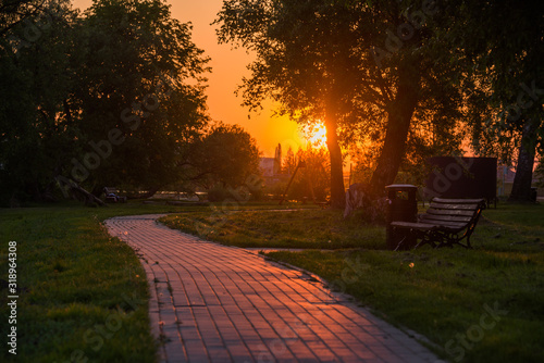 Beautiful sunset scene with pedestrian walkway in Kegums town, Latvia