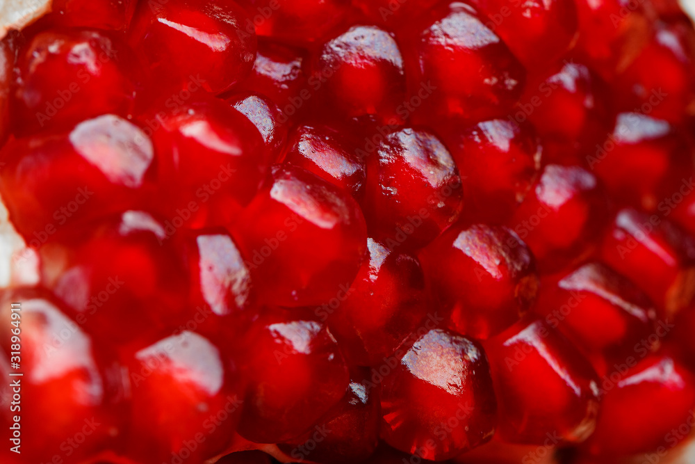 Red ripe and juicy seeds of fresh pomegranate fruit close-up. Red ripe and juicy seeds of fresh pomegranate fruit close-up.
