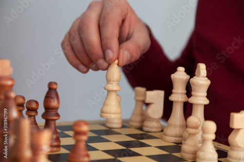 man hand chess