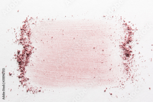 Tablou pe pânză Pale pink blush, face powder smudged on white paper