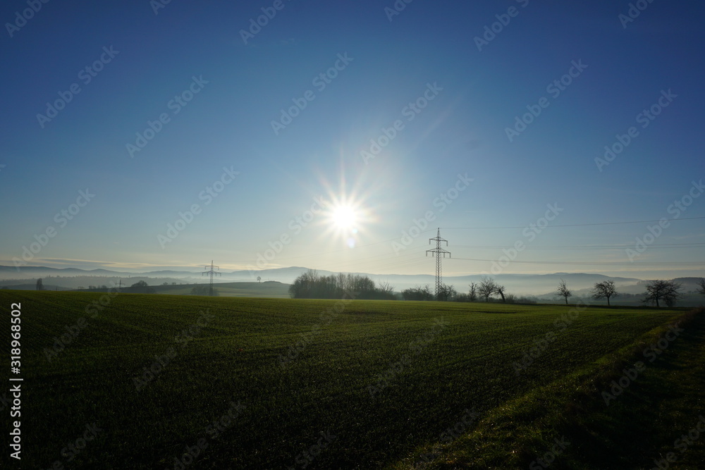 Sunrise over a field