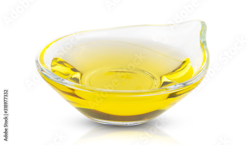 Sunflower oil in glass transparent bowl Isolated on a white background.