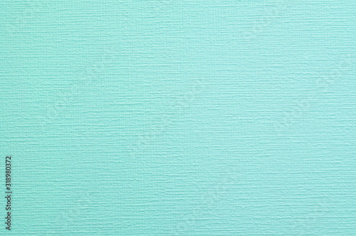 Mint green-blue wall. A simple background for design.