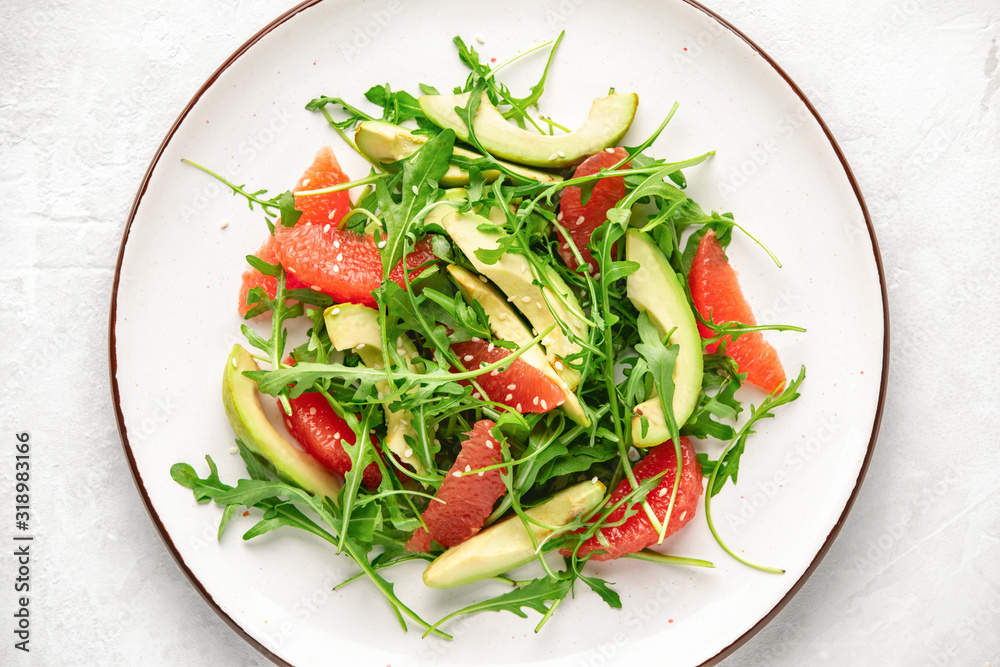 Detox grapefruit and arugula salad, top down view Detox grapefruit and arugula salad, top down view