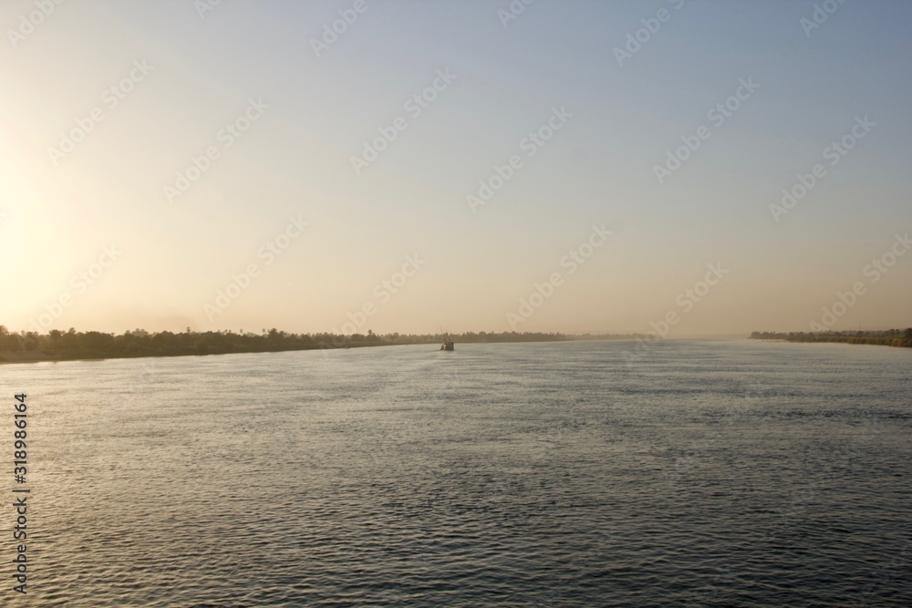 Sunset viewed from across a river