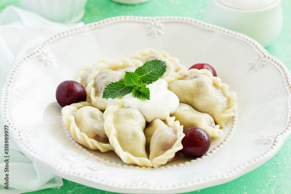 Dumplings with cherries. Ukrainian and Belarusian cuisine.