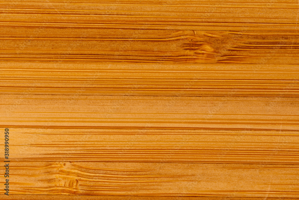 Fototapeta premium bamboo wooden kitchen cutting board background macro