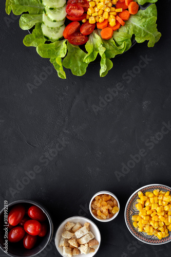 lettuce salad with tomato, cheese and vegetables