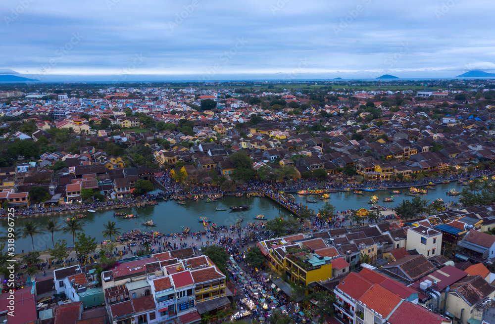 Fototapeta premium Aerial shot of Hoi An in Vietnam. Hoi An is an ancient trading port city an a UNESCO world heritage site