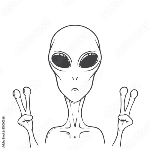 The alien shows peace sign