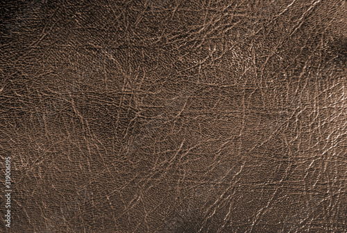 dark leather background in vintage style, dust and scratches