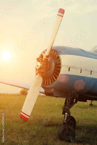 propeller of a plane on a sunset background. pilot training concept. toned
