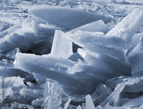 ice on the surface of the water in the river. toned