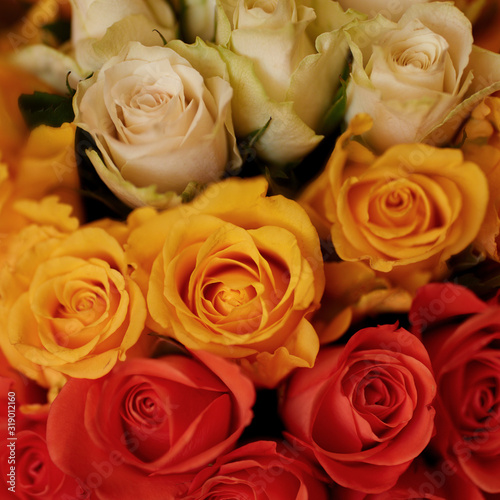 Close-up bouquet of red  yellow and white roses