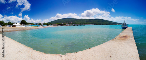 The waterfront resort of Kabardinka. Krasnodar region, Black sea. Ships in Tsemesskaya Bay photo