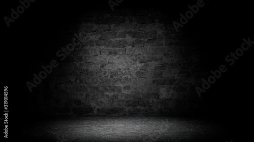 Abstract black brick with vignette background. Studio backdrop - well use as back drop background, black board, black studio background, black gradient frame photo