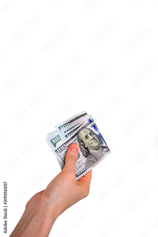 A hand is holding up dollars on an isolated, white background. Use it for a banking or finance concept. Copy space, image. A hand is holding up dollars on an isolated, white background. Use it for a banking or finance concept. Copy space, image.