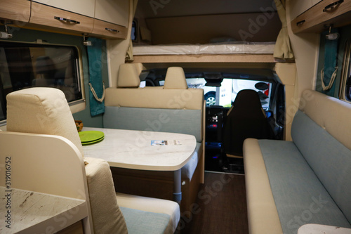 Interior of luxury caravan. Detail photo of coach with equipment