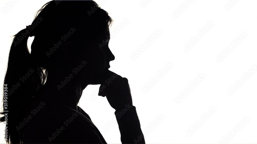 silhouette of young man thinking , guy seeking a solution of problem in meditation, concept of people feelings and life silhouette of young man thinking , guy seeking a solution of problem in meditation, concept of people feelings and life