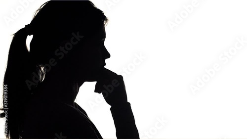 silhouette of young man thinking , guy seeking a solution of problem in meditation, concept of people feelings and life