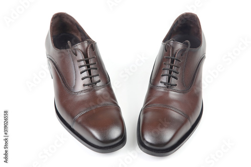 Classic men's brown shoes on white background