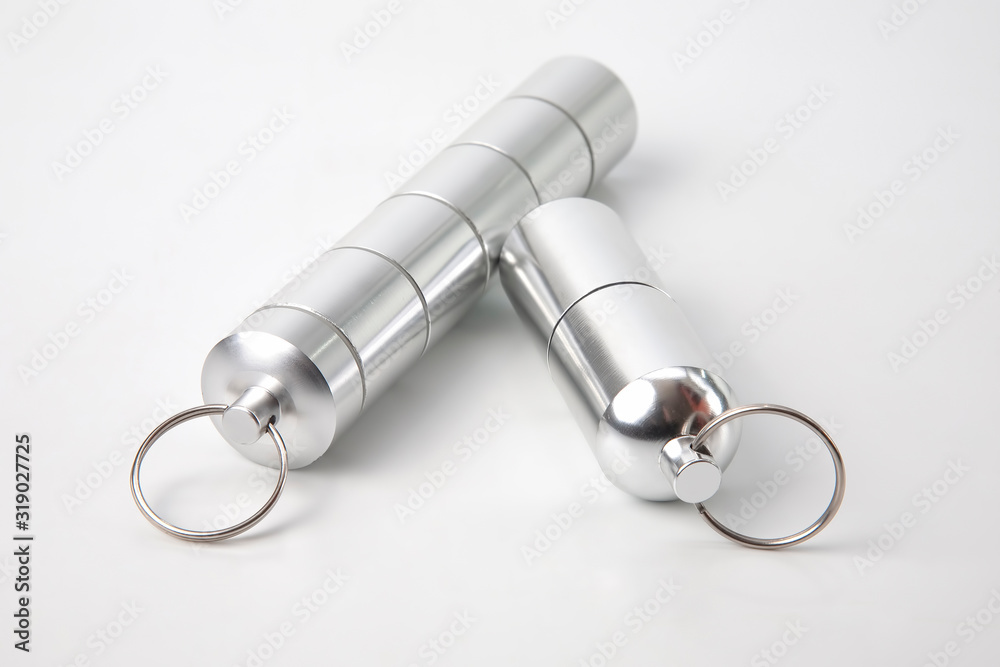 sealed aluminum containers for small items and medical pills on a white background sealed aluminum containers for small items and medical pills on a white background