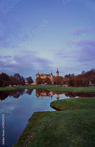 Schwerin Castle is reflected in the water. State capital Mecklenburg-Western Pomerania. photo