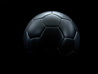 Black football against black background.