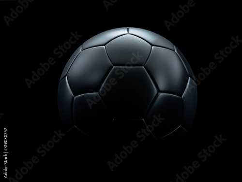 Fototapeta Naklejka Na Ścianę i Meble -  Black football against black background.