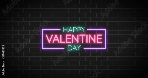 Neon sign.Valentine sign on brick background.