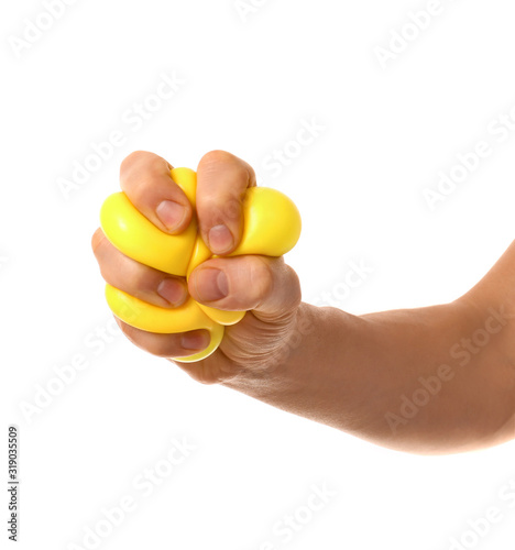 Hand squeezing stress ball ...