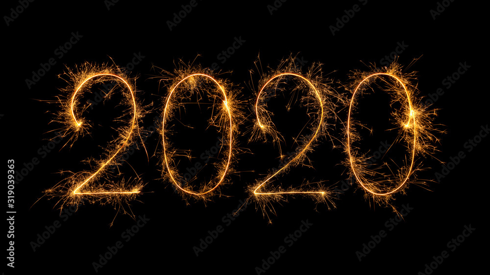 Happy New Year 2020 written with bengal fire, sparkler fireworks candle isolated on a black background. New Year dark backdrop. Happy New Year 2020 written with bengal fire, sparkler fireworks candle isolated on a black background. New Year dark backdrop.