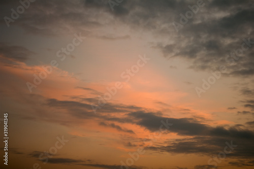 An orange sky textured background. Vertical orientation