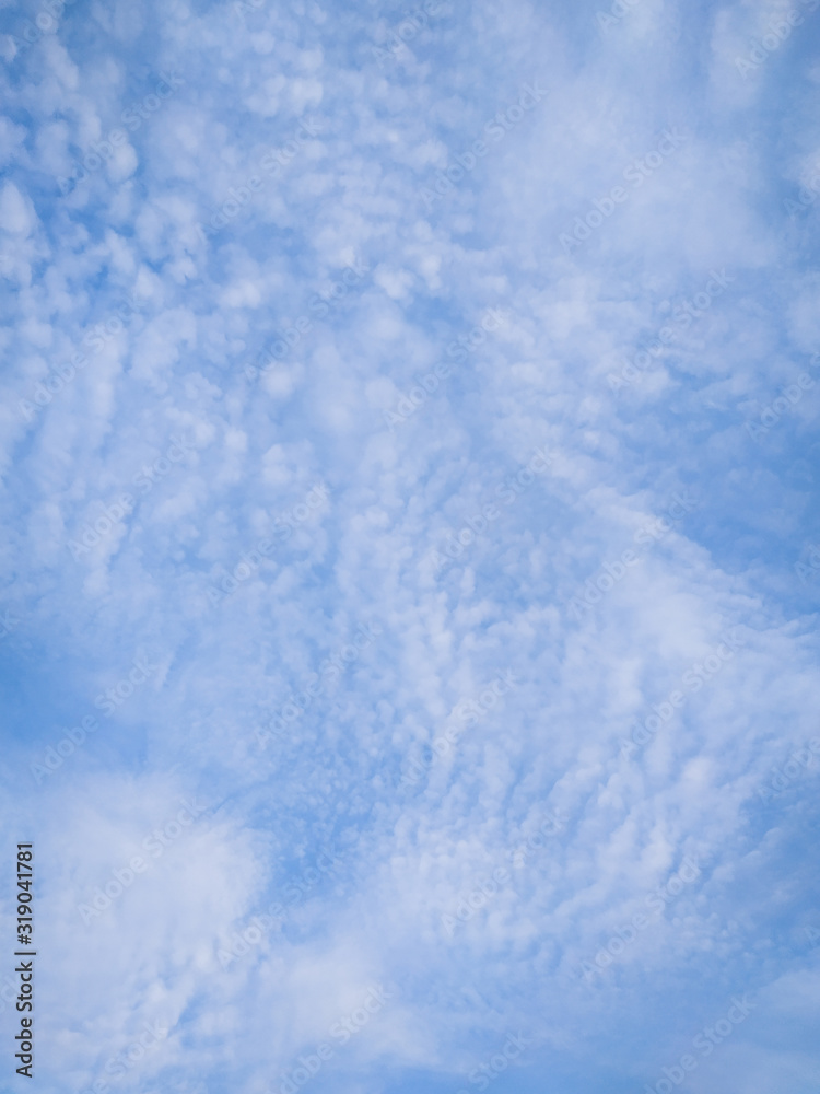 cloudscape with white altocumulus clouds at evening cloudscape with white altocumulus clouds at evening