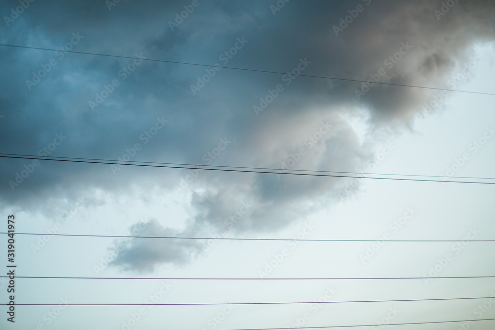 clouds and wires in the background clouds and wires in the background