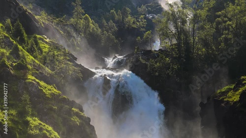 Latefossen is one of the most visited waterfalls in Norway and is located near Skare and Odda in the region Hordaland, Norway. Consists of two separate streams flowing down from the lake Lotevatnet. photo