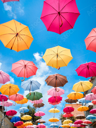 Colorful umbrellas. Colorful umbrellas in the sky. Street decoration.