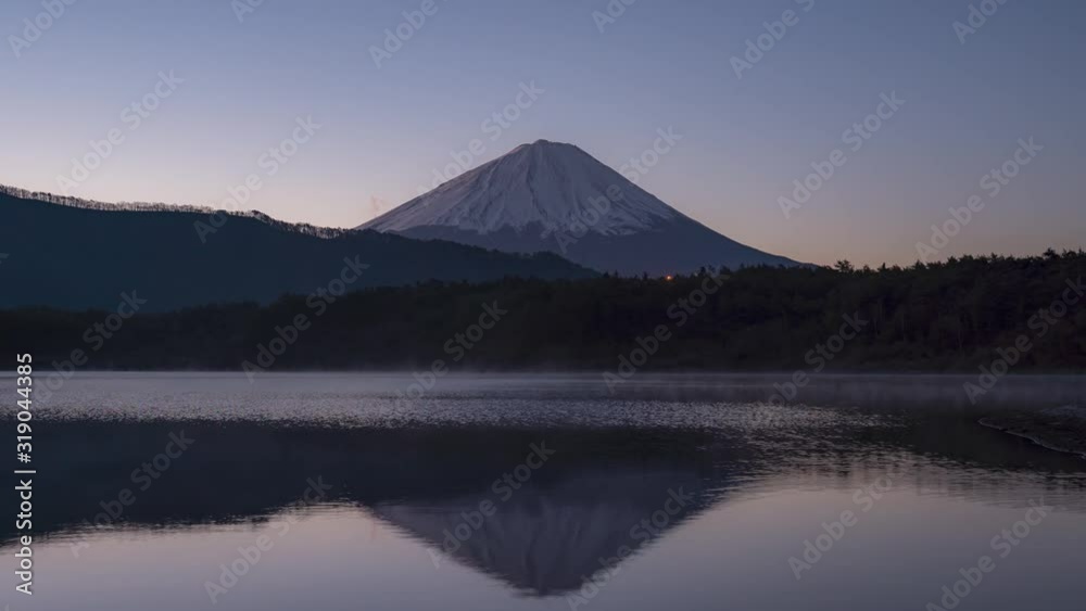 Sunrise at lake Saiko and Mt Fuji in Kawaguchiko in Japan. Reflection of Mt Fuji Sunrise at lake Saiko and Mt Fuji in Kawaguchiko in Japan. Reflection of Mt Fuji